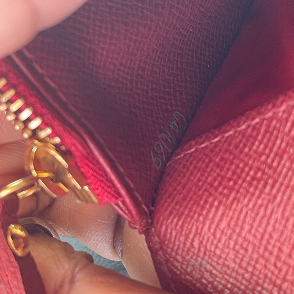 LV monogram insolite wallet with red interior for sale. No heat stamp.